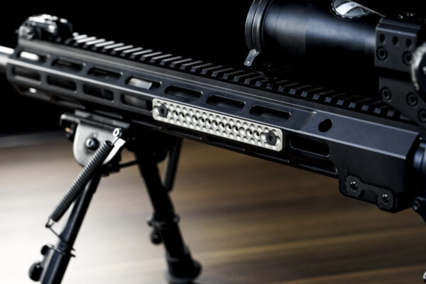 tan, long rail cover on a rifle