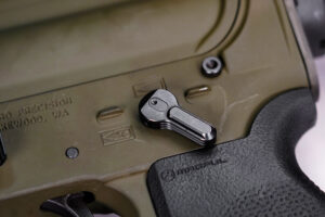Live photo of an AR 15 safety selector on a firearm.